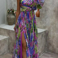 WW | Maxikleid mit sexy Seitenschlitz und einem Ärmel in lila Druck