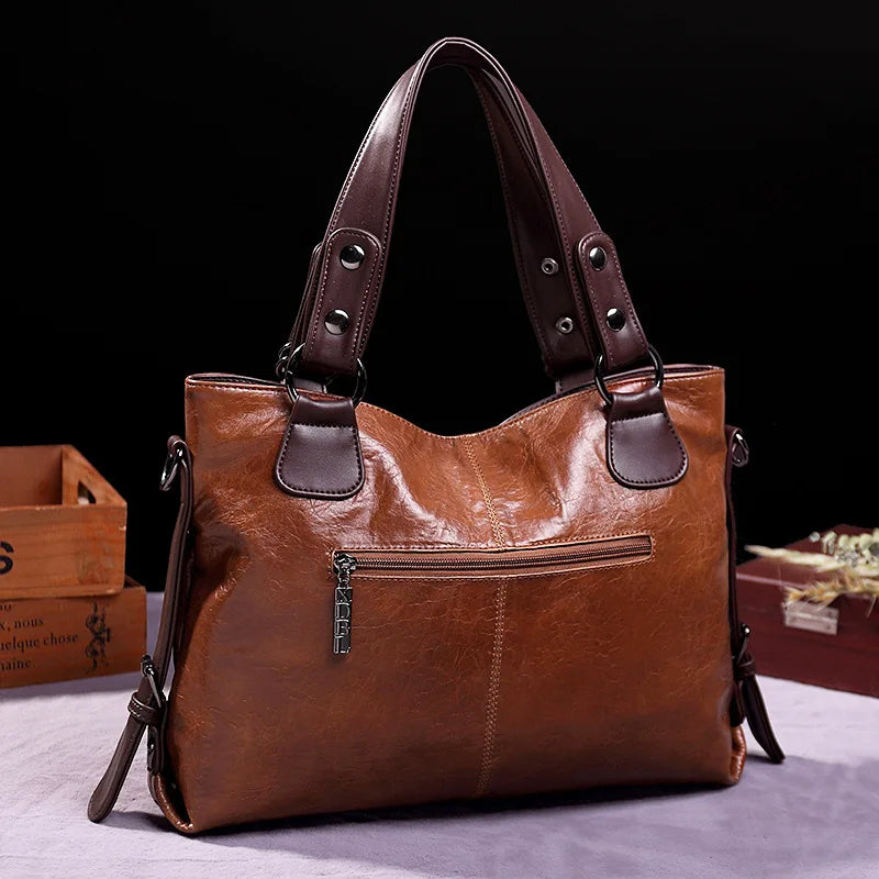 WW | Taschen aus Geschmeidigem Leder mit Zwei Riemen und Eleganten Details