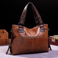 WW | Taschen aus Geschmeidigem Leder mit Zwei Riemen und Eleganten Details