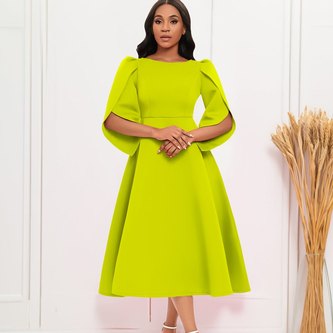 W&W Mode - Elegantes grünes Rüschenkleid