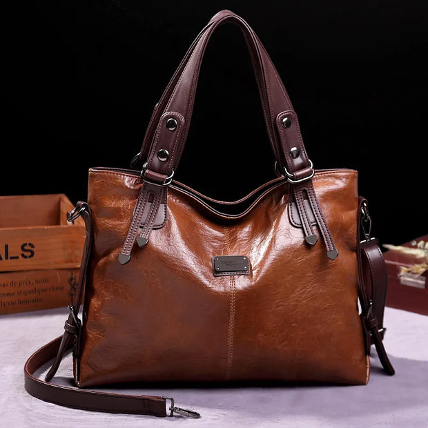 WW | Taschen aus Geschmeidigem Leder mit Zwei Riemen und Eleganten Details