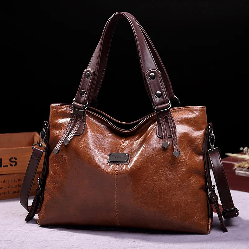 WW | Taschen aus Geschmeidigem Leder mit Zwei Riemen und Eleganten Details