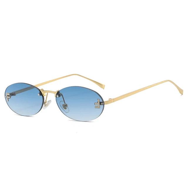 W&W Mode | Ovale Sonnenbrille Mit Goldenen Akzenten Und Subtilen Steinen