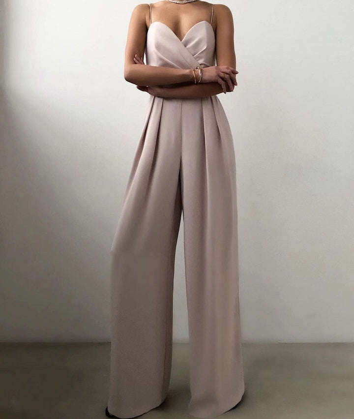 Model trägt einen aprikose sexy riemen-overall