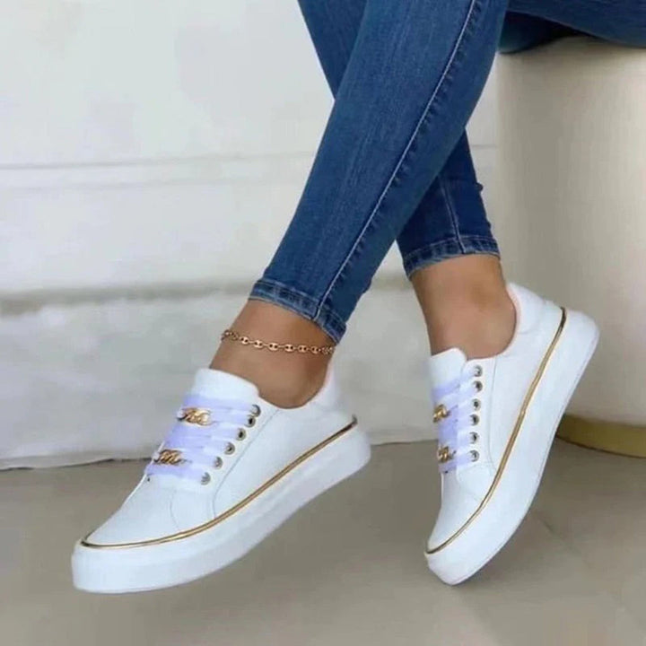W&W Mode | stilvolle Damenschuhe Sneakers mit goldenen Akzenten