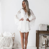 WW | Minikleid Boho Stil Flare Passform Tiefer V-Ausschnitt Lange Trompetärmel