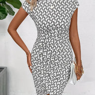 WW | Elegantes Kleid mit Rundhalsausschnitt und Allover-Print