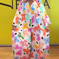 Noa - Lässiges Kleid mit Trompetenärmeln und Blumenmuster
