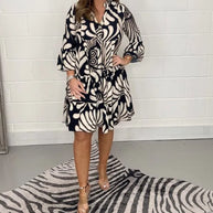 Elegantes Sommerkleid mit V-Ausschnitt