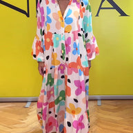 Noa - Lässiges Kleid mit Trompetenärmeln und Blumenmuster
