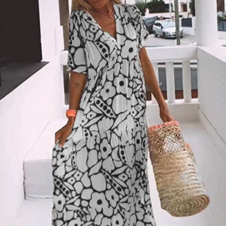 WW | Lockeres, Schlankmachendes Blumenkleid in Großen Größen