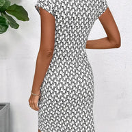 WW | Elegantes Kleid mit Rundhalsausschnitt und Allover-Print