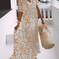 WW | Lockeres, Schlankmachendes Blumenkleid in Großen Größen