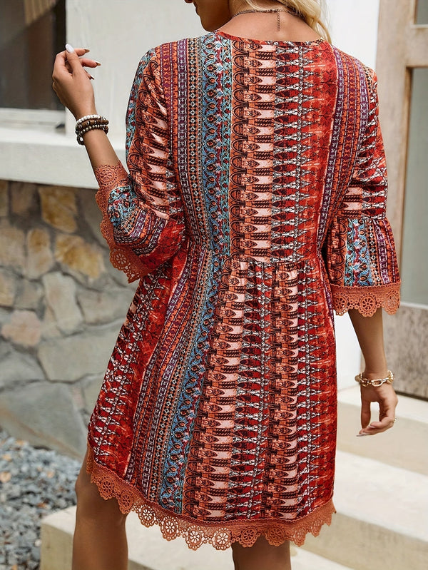 WW | Elegantes Kleid mit V-Ausschnitt und Spitzenabschluss