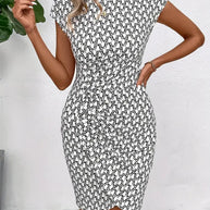 WW | Elegantes Kleid mit Rundhalsausschnitt und Allover-Print