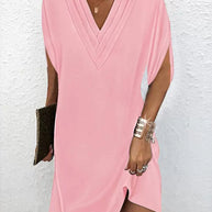 Elegantes Kleid mit geschlitzten Ärmeln