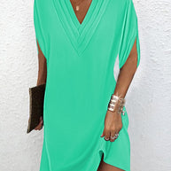 Elegantes Kleid mit geschlitzten Ärmeln