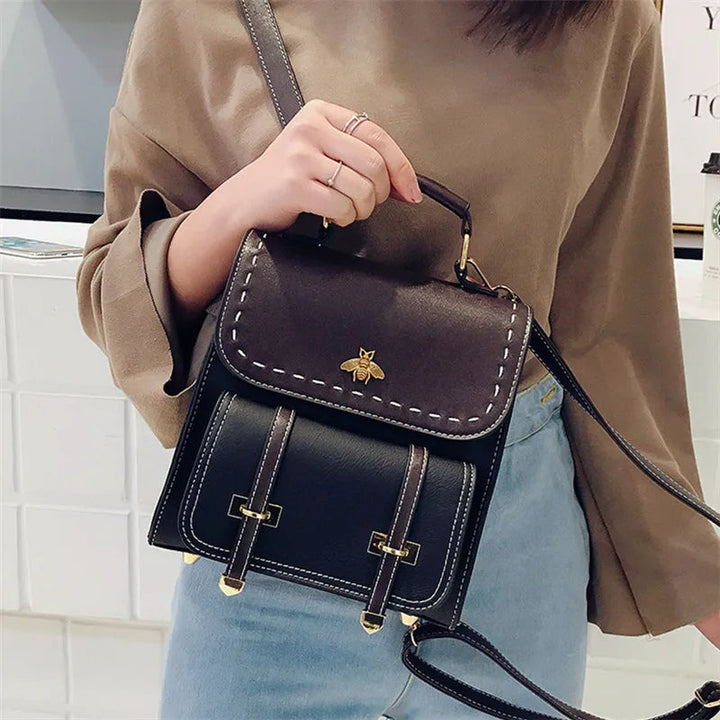 Veganer Kunstlederrucksack mit Tragegriff und vielseitigem Tragegurt