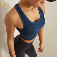 WW | Sport-BH Top mit gekreuzten Trägern und Netzrücken aus luftigem dehnbarem Material