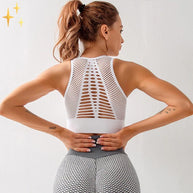 WW | Sport-BH Top mit gekreuzten Trägern und Netzrücken aus luftigem dehnbarem Material