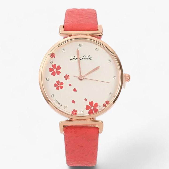 Damen-Armbanduhr mit rundem Zifferblatt und Blumenmotiv