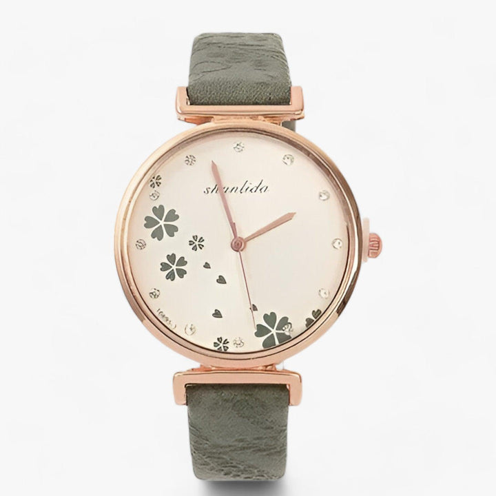 Damen-Armbanduhr mit rundem Zifferblatt und Blumenmotiv