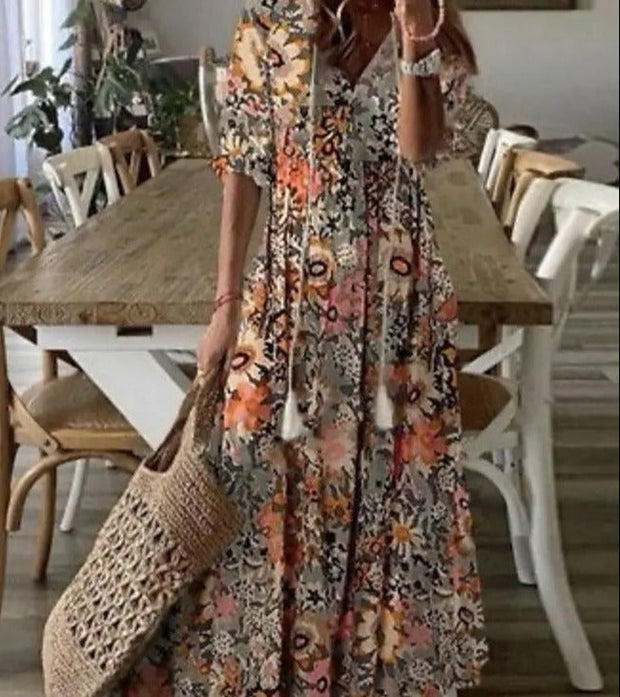 WW | Maxikleid mit halben Ärmeln und V-Ausschnitt mit Blumenmuster