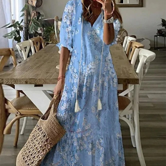 WW | Maxikleid mit halben Ärmeln und V-Ausschnitt mit Blumenmuster