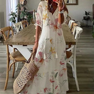 WW | Maxikleid mit halben Ärmeln und V-Ausschnitt mit Blumenmuster