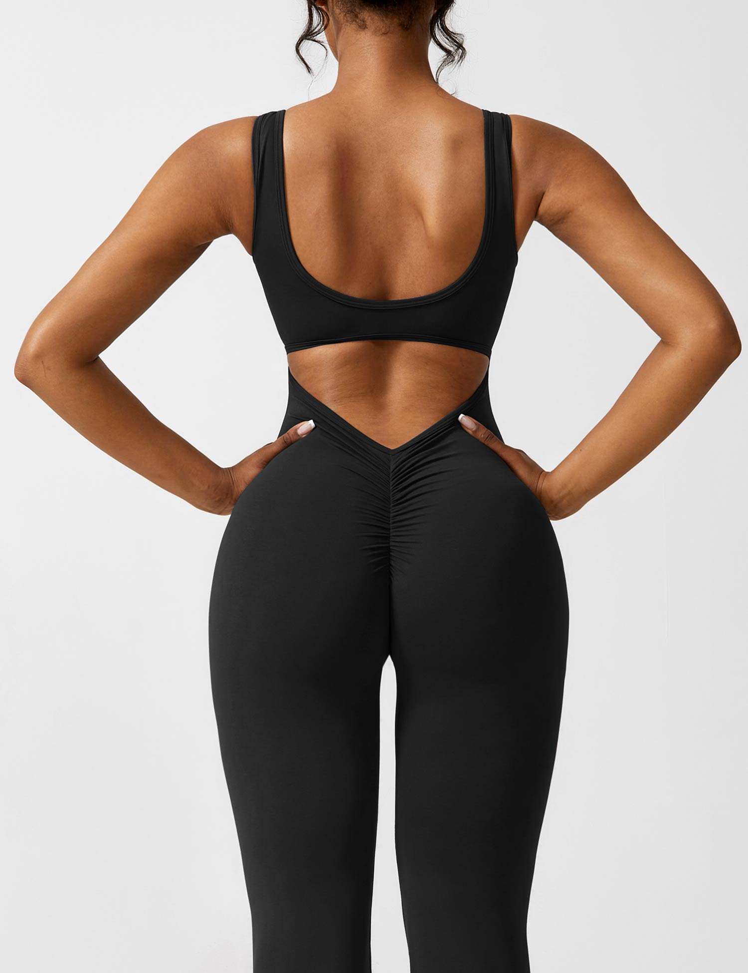WW | V-Rücken Auslaufender Jumpsuit