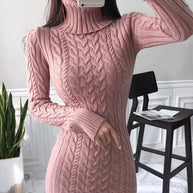 Spiegel-Selfie einer Frau im Rosa Strickkleid