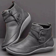 Ein paar grau orthopädische stiefel
