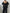 Ein modell in einem schwarz sexy riemen-overall und blazer